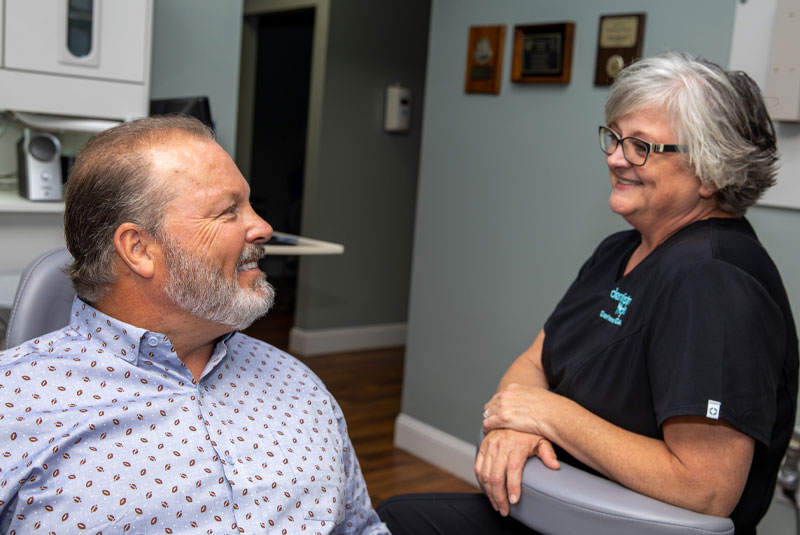 rda talking to dental implant patient